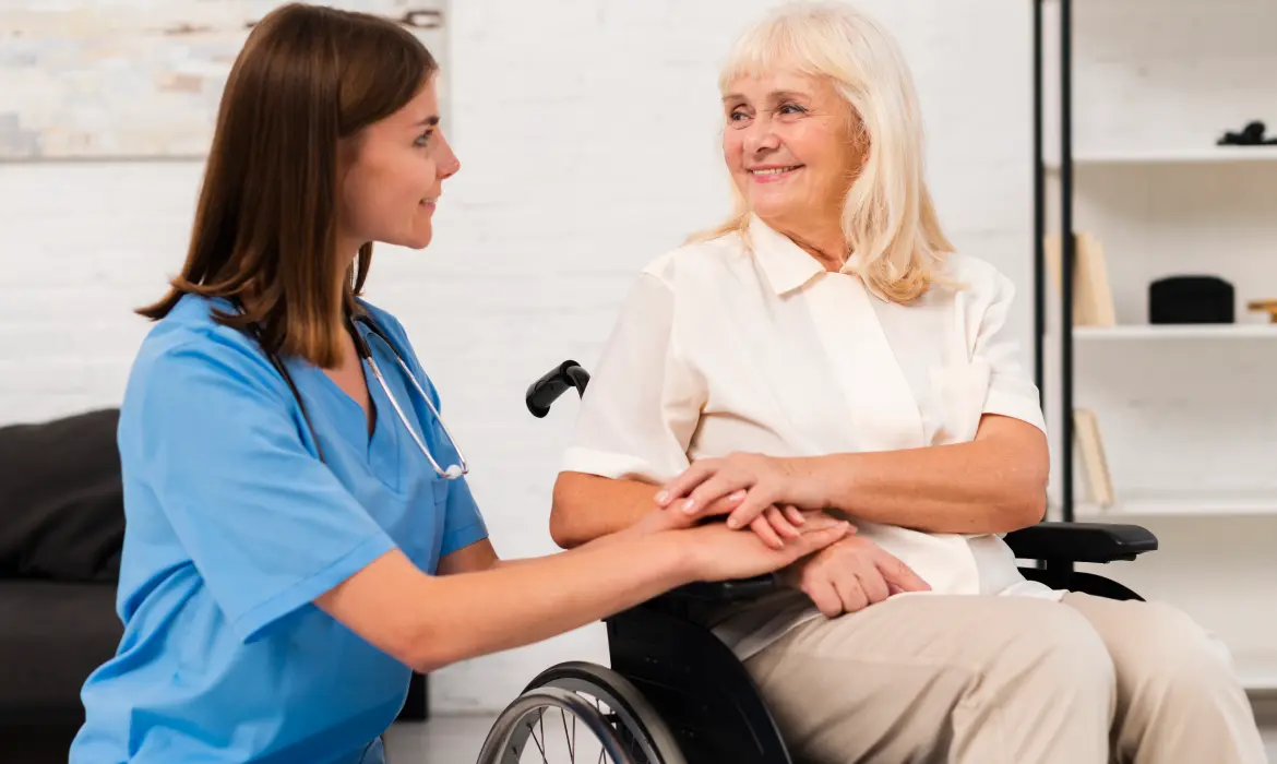 nurse helping old lady